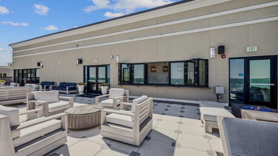 patio furniture and a large patio with a view at The  Alexa